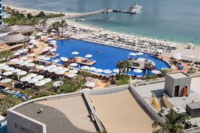 Livbnb Suites - 1BR with Sea View & Beach Access